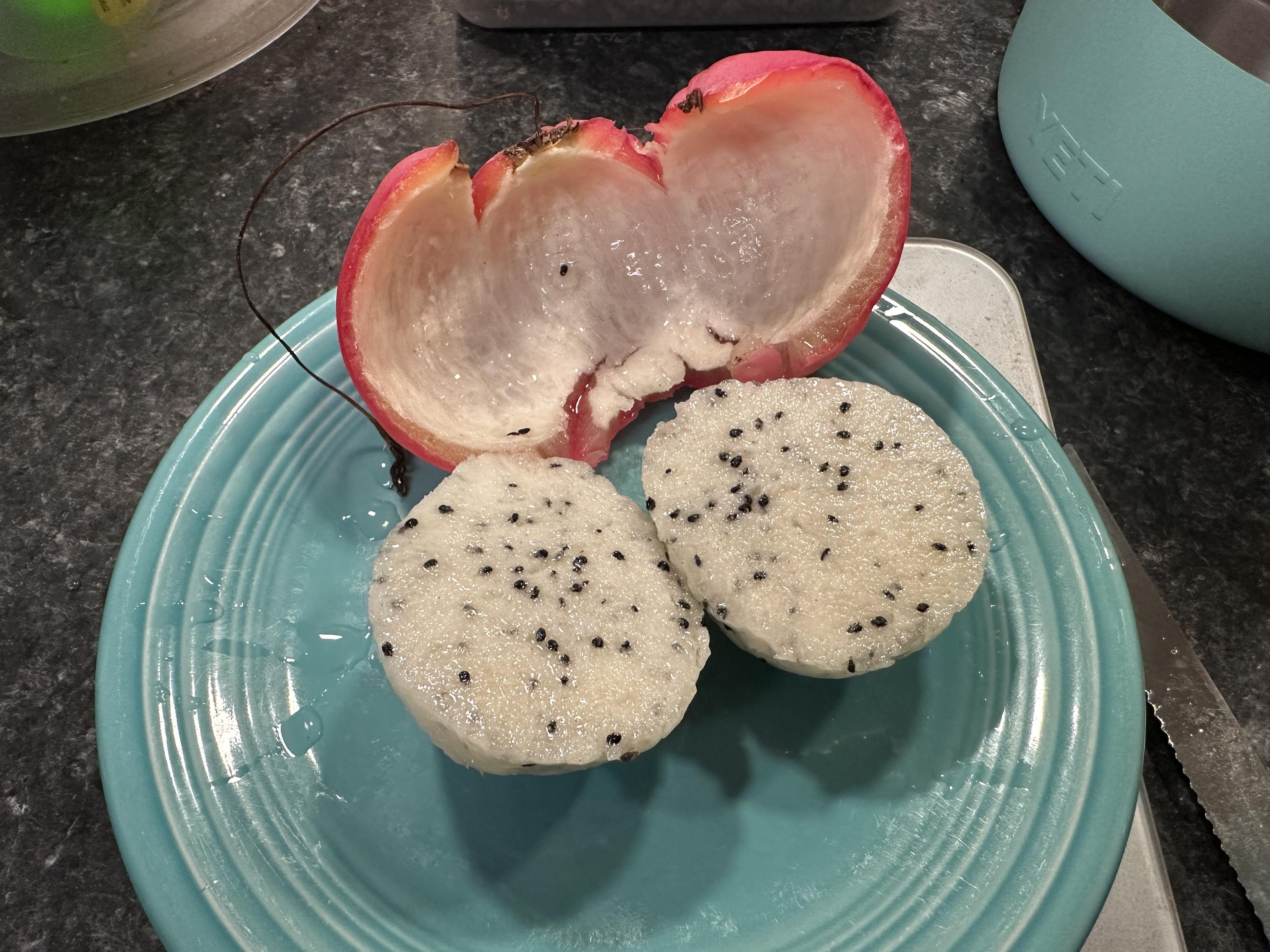 Cactus* Apple, peeled with its thick pink peel aside and the white fruit with its crunchy pink seeds
*Cereus Peruvianus
